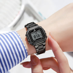 all black digital watch on wrist - OLEVS 1111