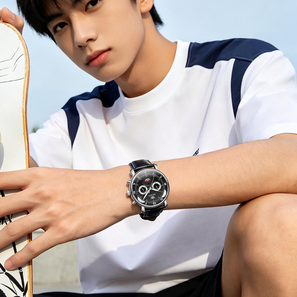 black dial watch on wrist - OLEVS 3753