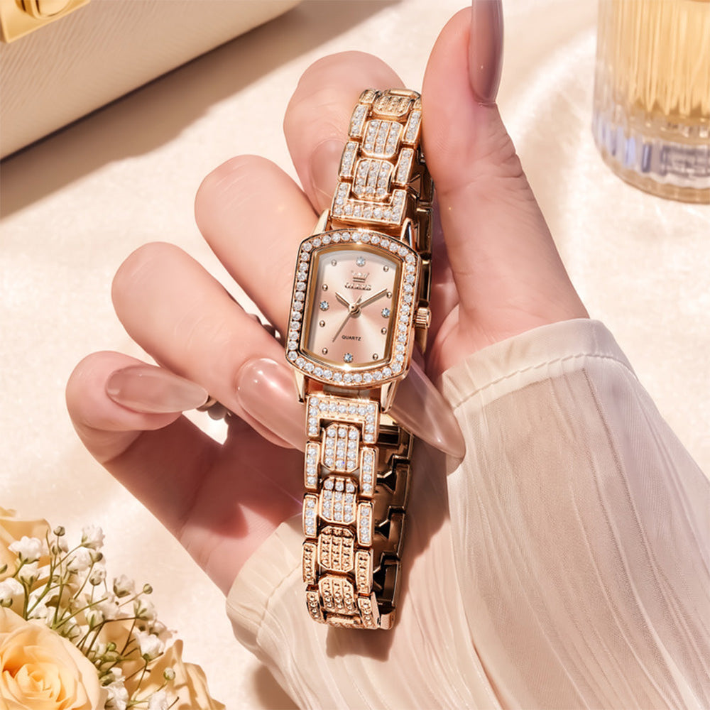 Rose gold OLEVS 7142 women's quartz watch displayed in hand - OLEVS 7142