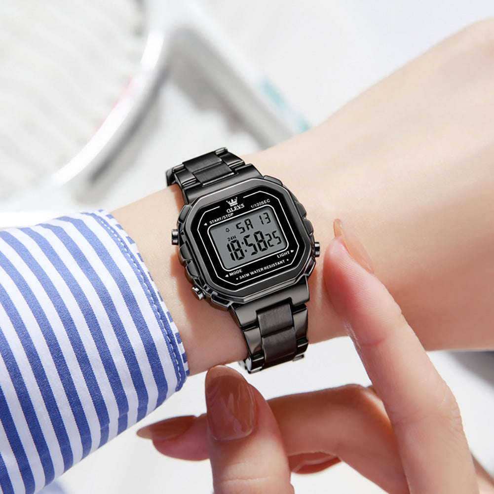 all black digital watch on wrist - OLEVS 1111
