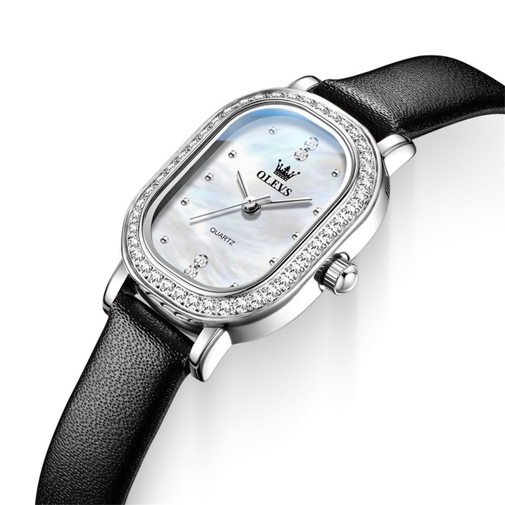 Black leather strap and silver white dial closeup - OLEVS 5697