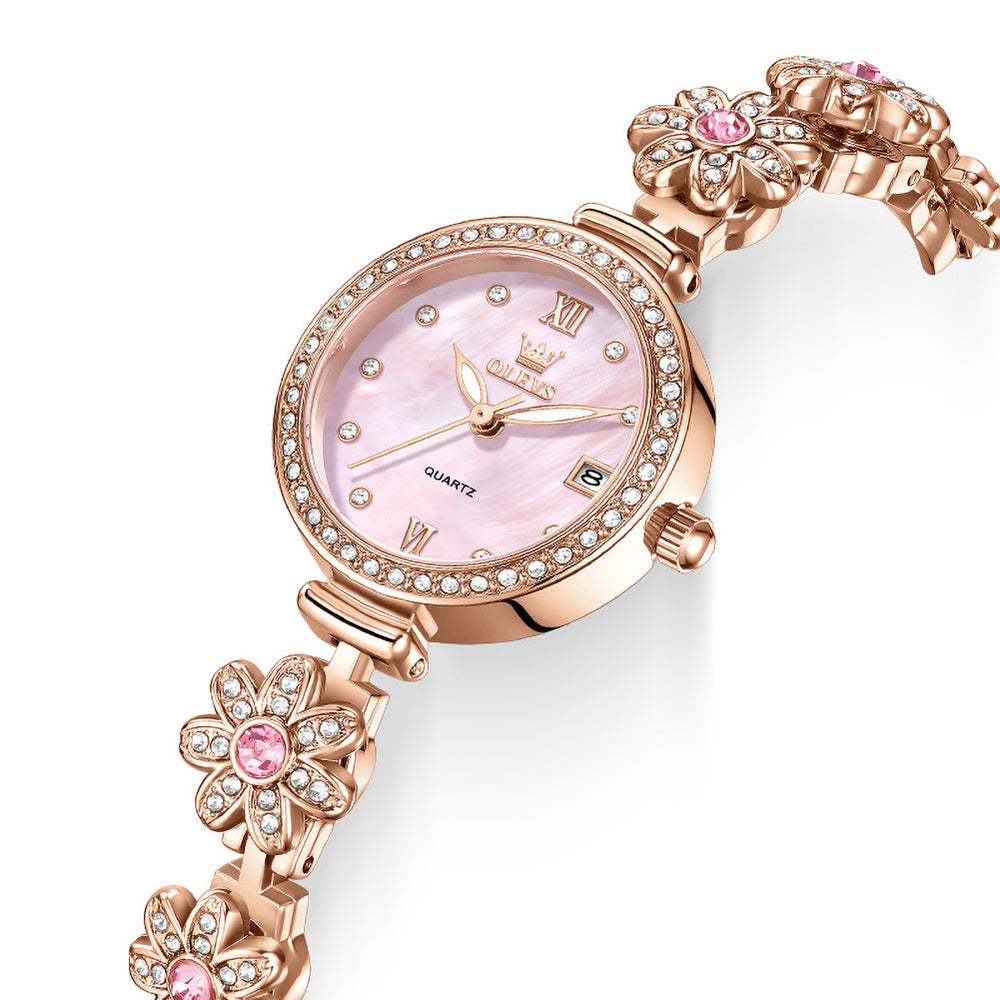 pink dial and sparkling floral bracelet close up - OLEVS 5699