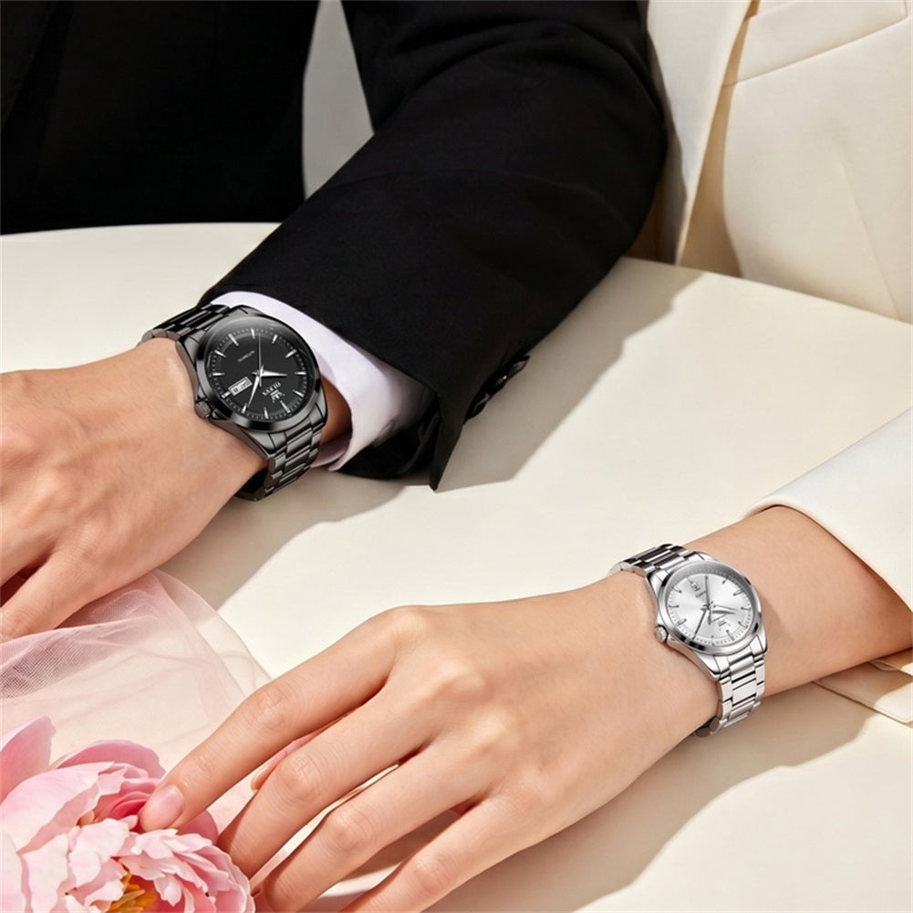 all black men's and silver white women's watches on wrists - OLEVS 7090